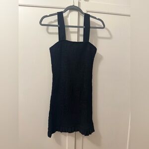 Cute black dress with small ruffles on bottom